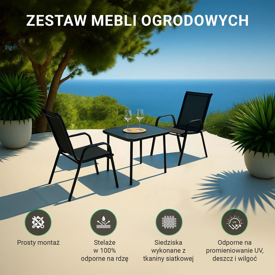 Zestaw mebli ogrodowych ze stołem, krzesłami i kieliszkami nad morzem.