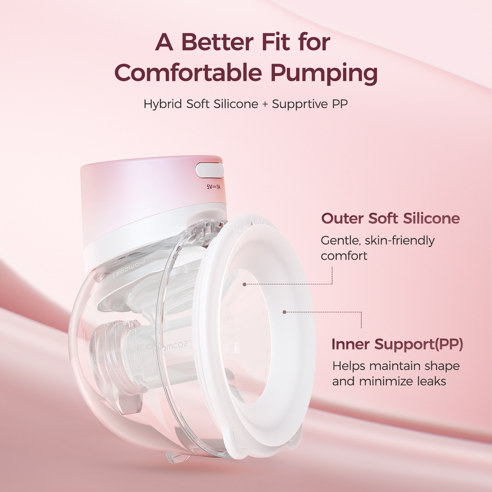 A pink and white breast pump with text about comfort and materials.