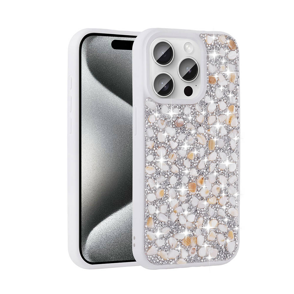 Arkası parıltılı taş desenli beyaz bir telefon.
