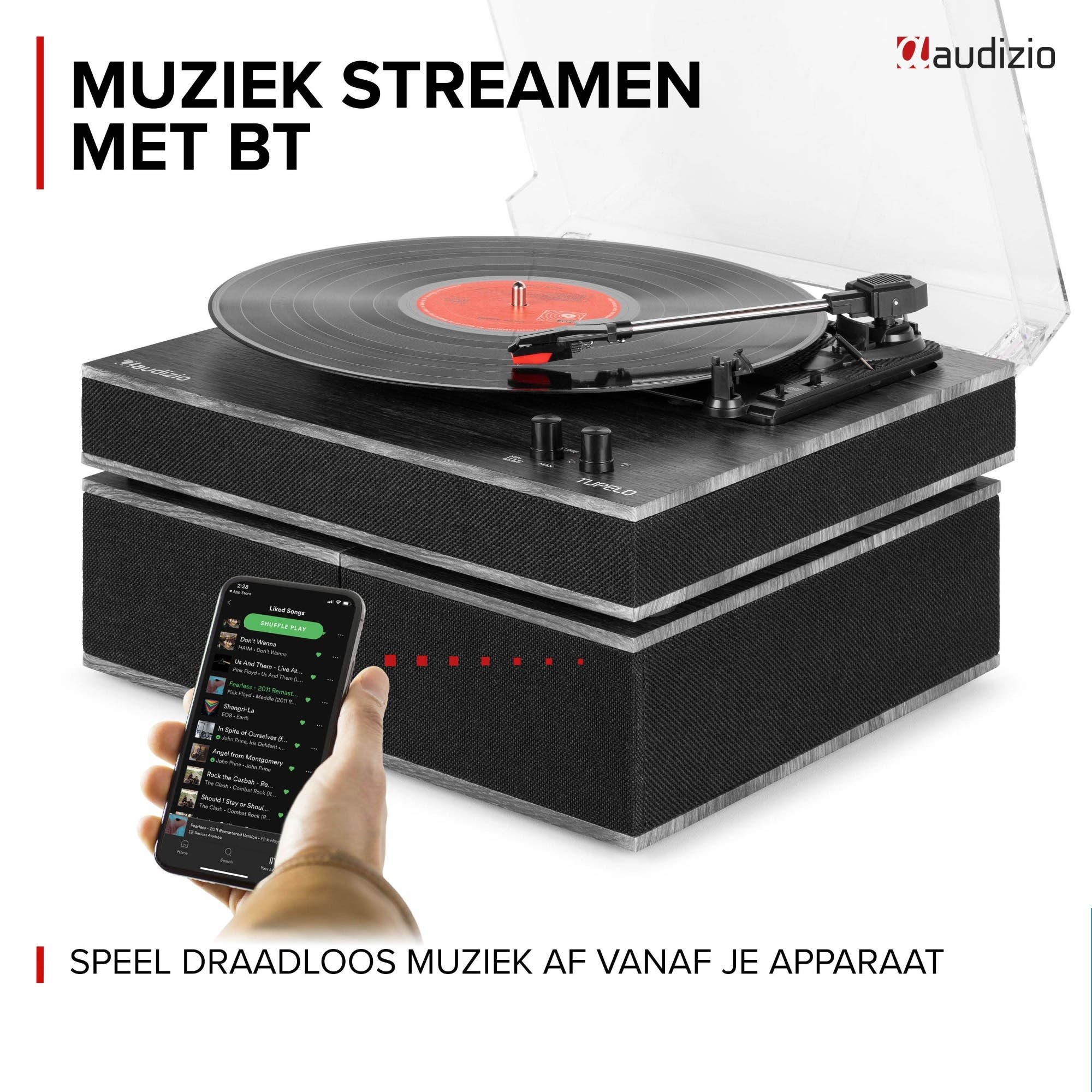 Tocadiscos negro con disco de vinilo, sujetando un smartphone.