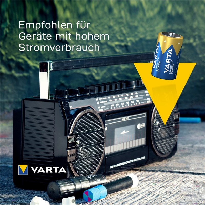 Ein tragbares Kassettengerät mit einer Varta-Batterie und Text.