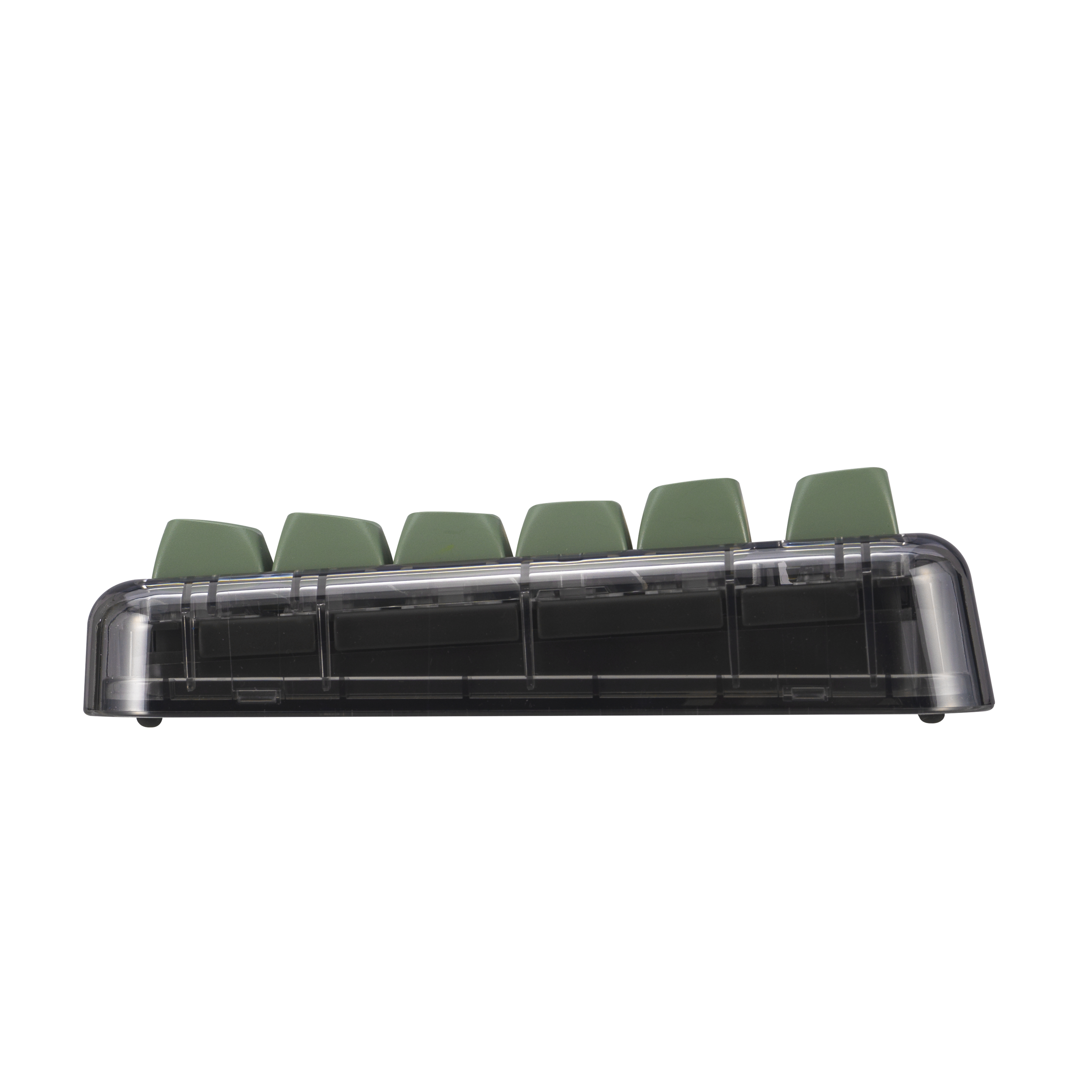 Un primo piano di una tastiera trasparente con tasti verdi.
