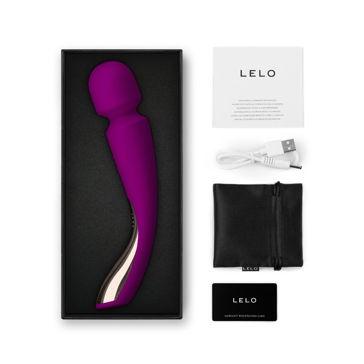 Lila Vibrator in Box, mit Ladekabel, Tasche, Anleitung und Garantiekarte.