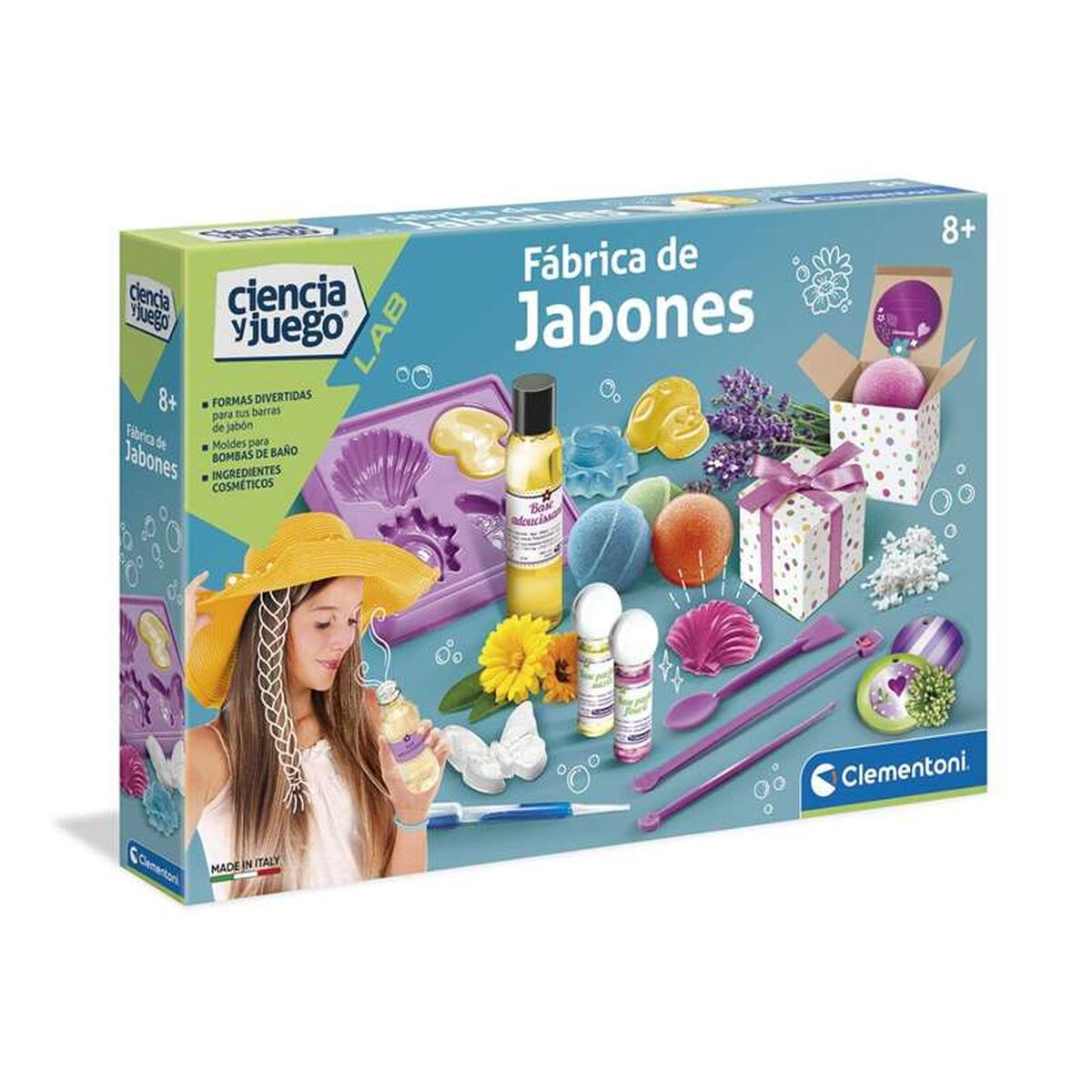 Kit fábrica de jabón con moldes, ingredientes y una niña sosteniendo jabón.