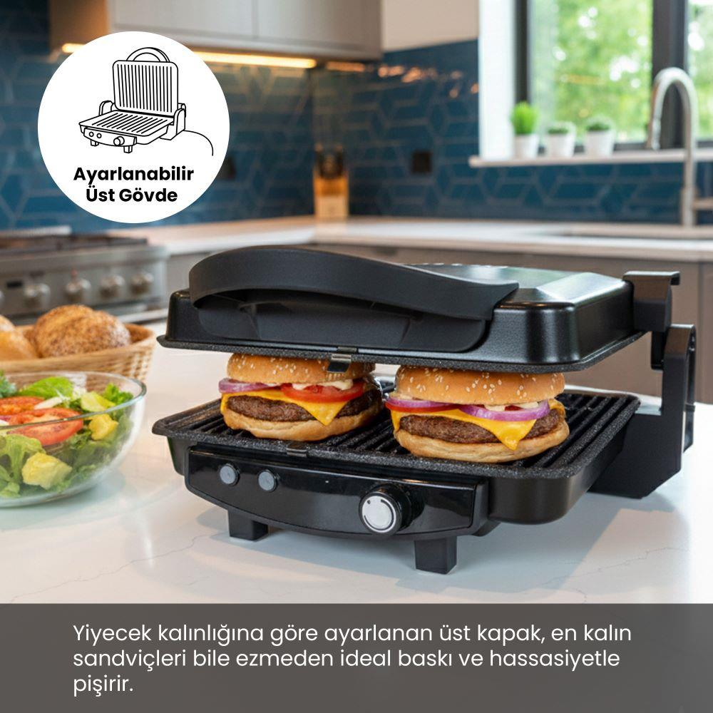 İki burgerli sandviç makinesi, yanında salata kasesi.