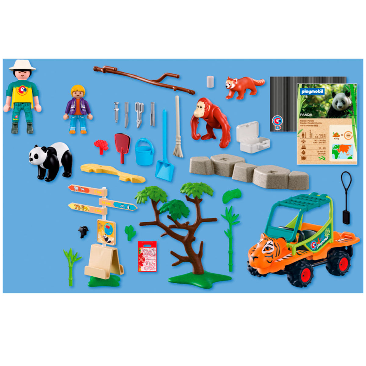 Set de zoo Playmobil con figuras, animales, jeep y accesorios sobre fondo azul.