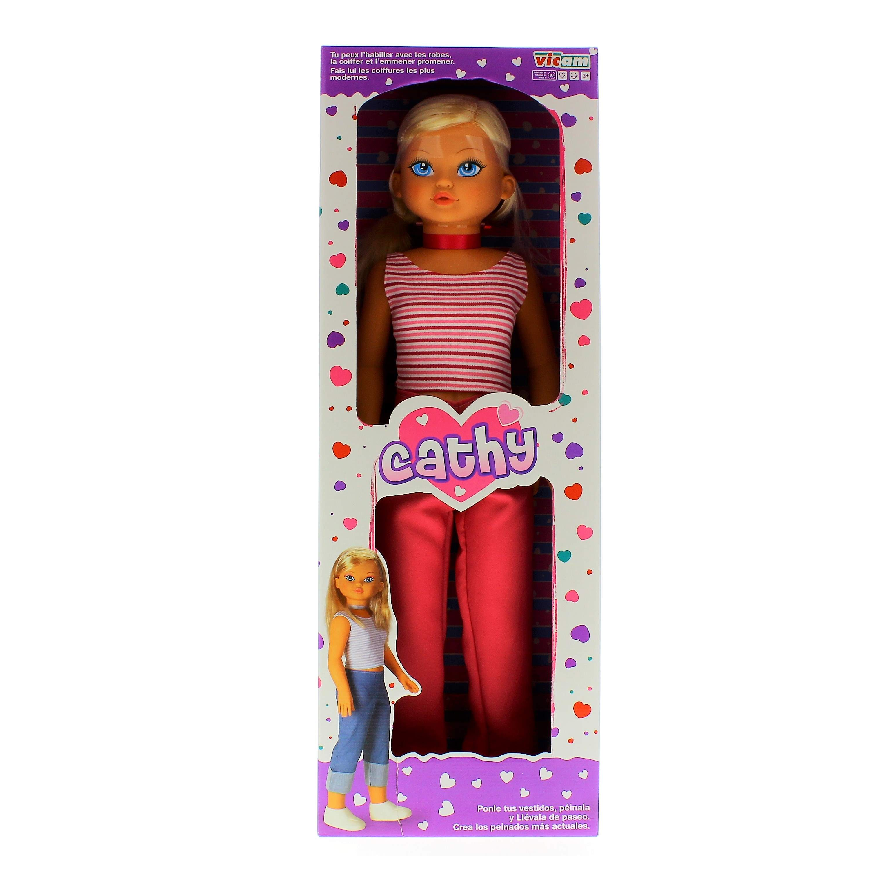Una muñeca Cathy con top de rayas rosas y pantalones en una caja.