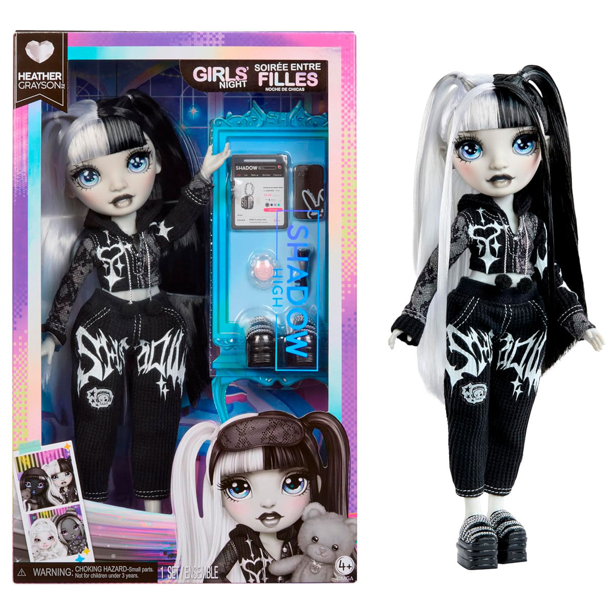 Muñeca Heather Grayson con cabello dividido blanco y negro, vestida con atuendo negro y estampados.