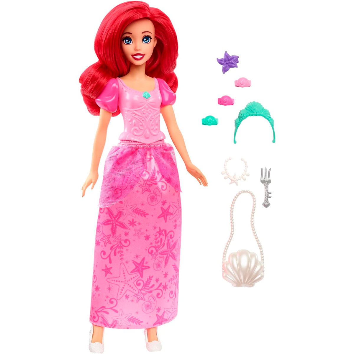 Muñeca Ariel con pelo rojo, vestido rosa y accesorios temáticos del océano como corona y bolso concha.