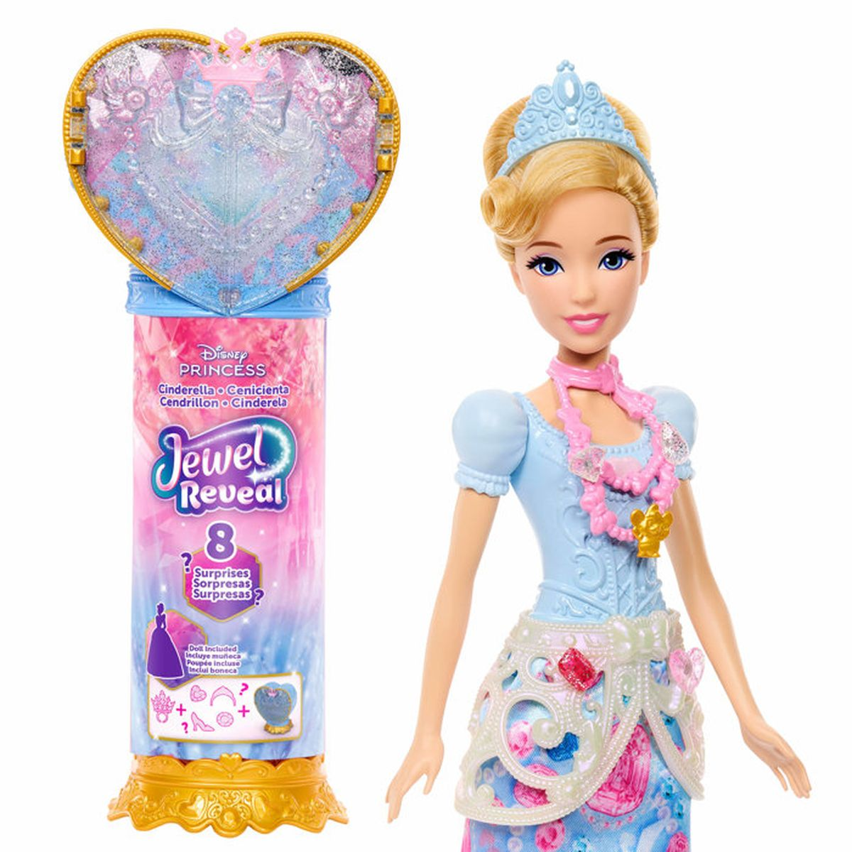 Muñeca de Cenicienta junto a un recipiente en forma de corazón con "Jewel Reveal".