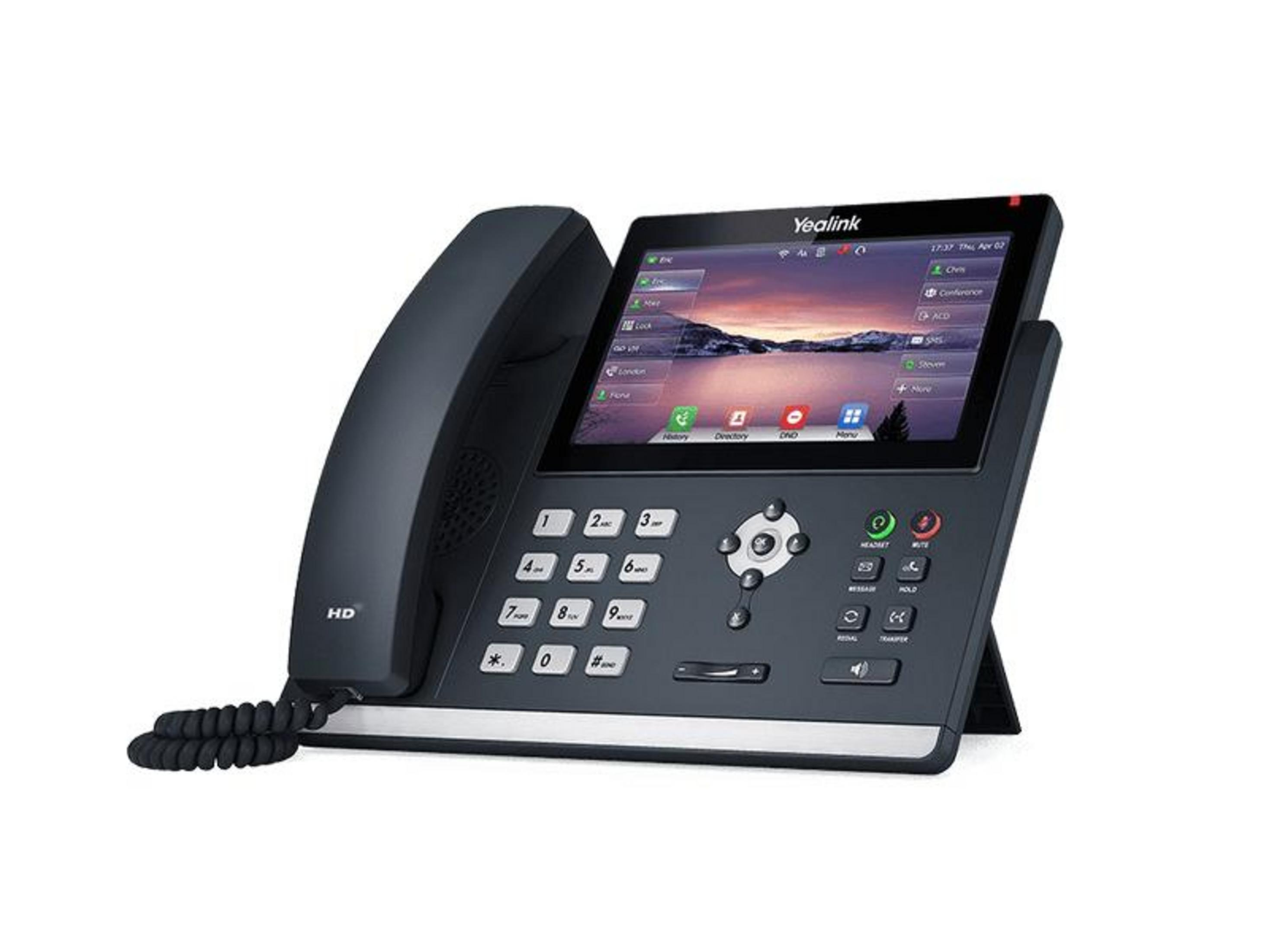 Un teléfono de escritorio negro Yealink con pantalla táctil y teclado.