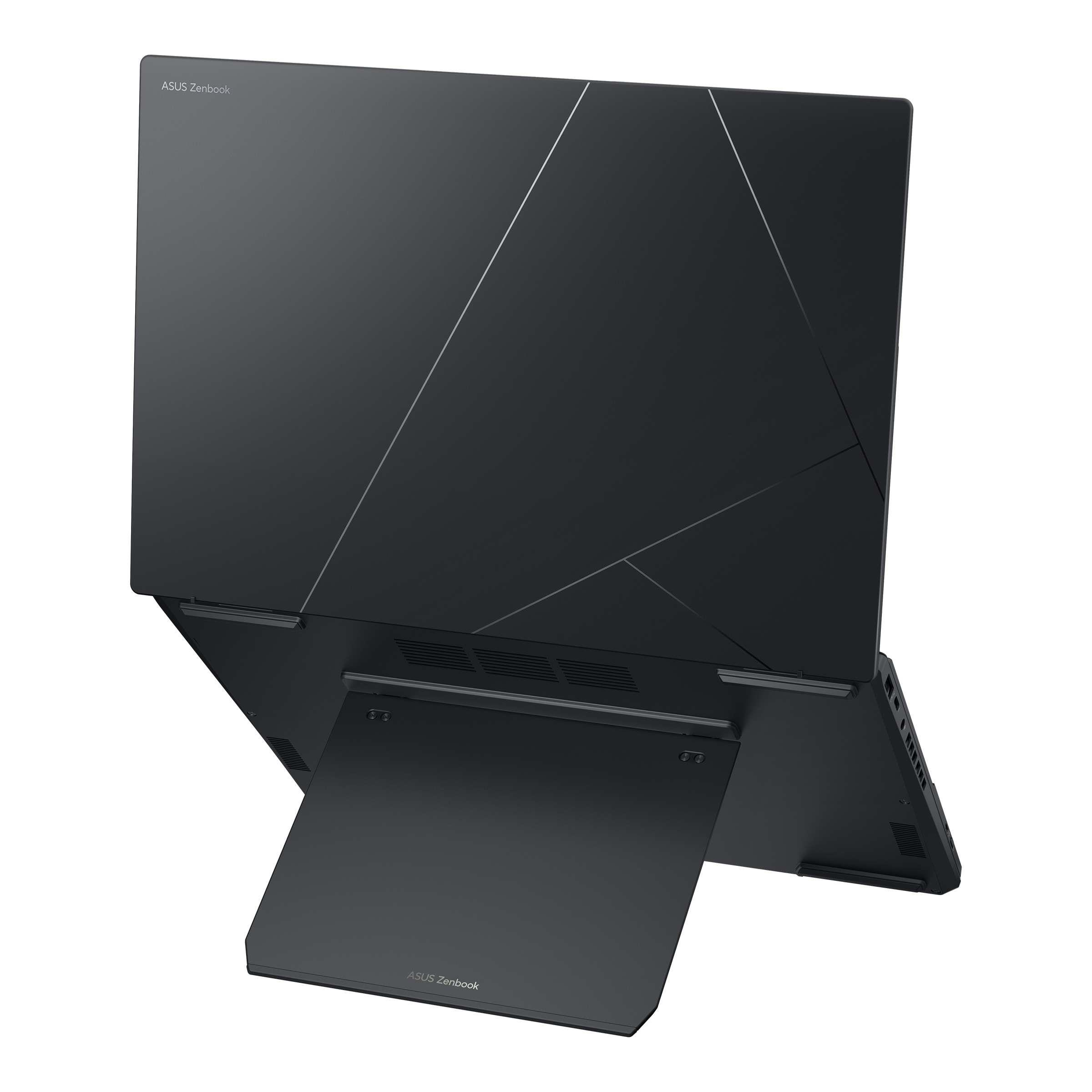 Tabanı ywkseltilmiŗ, kapaėında wizgili deseni olan siyah Asus Zenbook laptop.