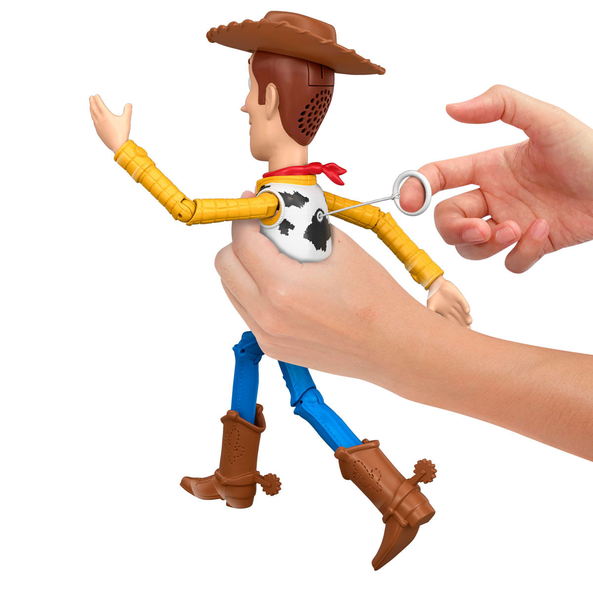 Muñeco Woody sostenido por manos, operado con mecanismo de cuerda.