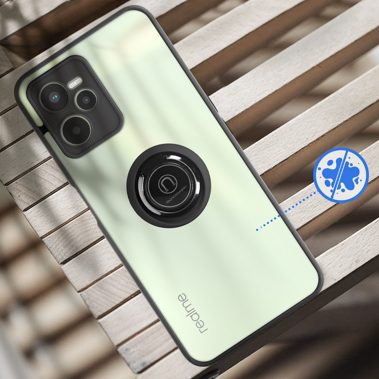 Un telefono verde chiaro con modulo fotocamera e anello porta-cellulare.