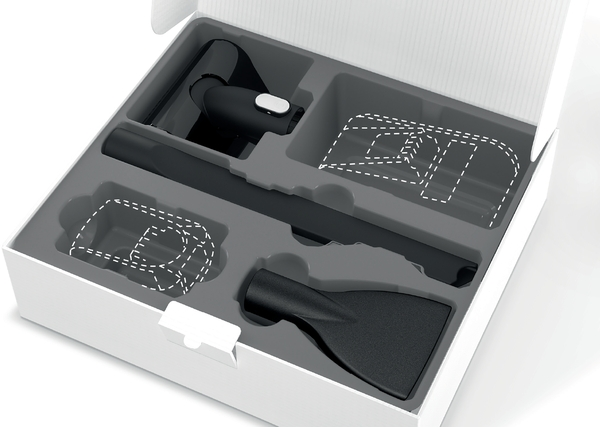 Accesorios de aspiradora en caja blanca con inserto gris.