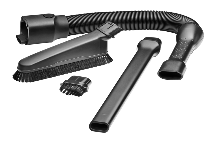 Un tubo nero e vari accessori per aspirapolvere su sfondo nero.