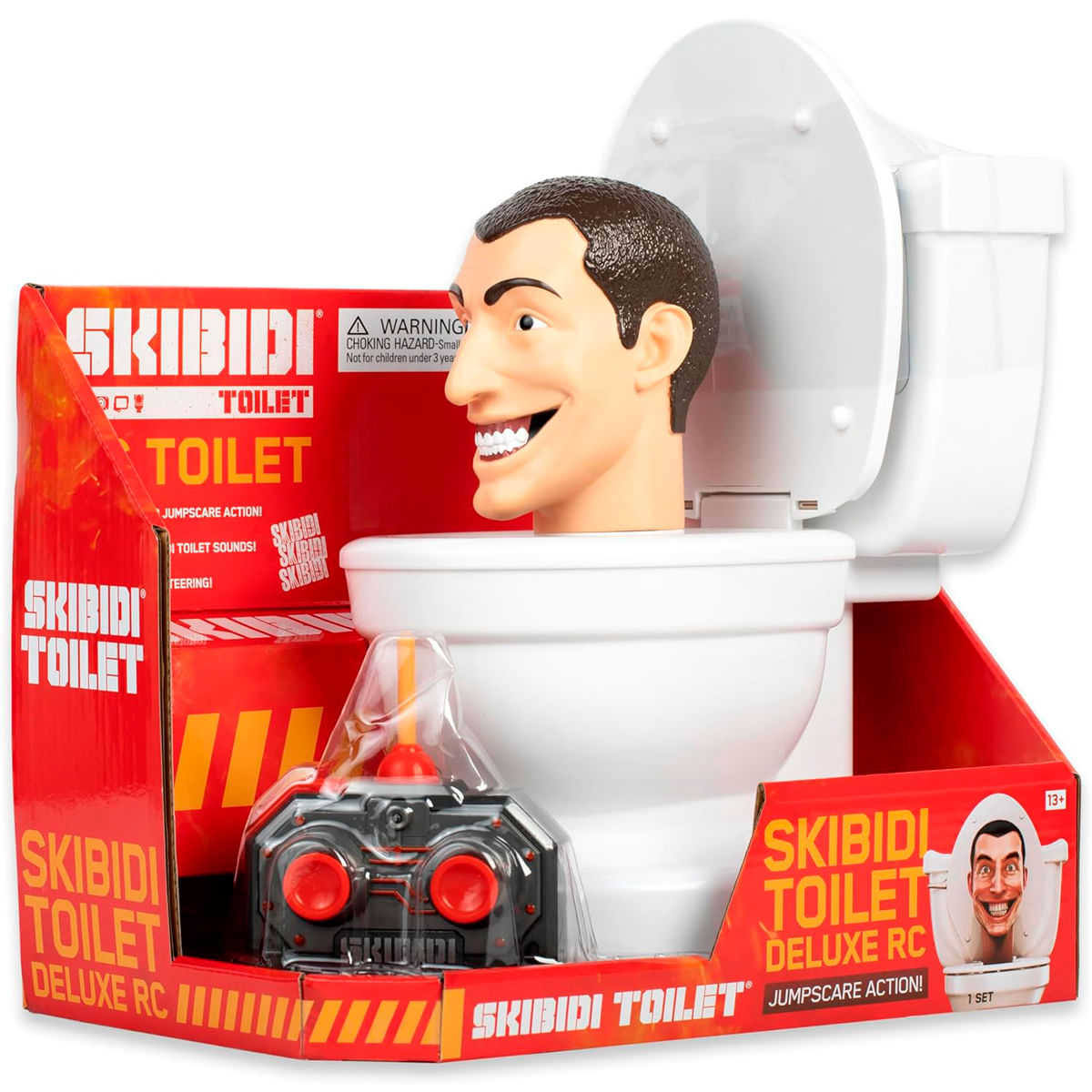 Un inodoro de juguete con cabeza sonriente y mando a distancia en su caja.