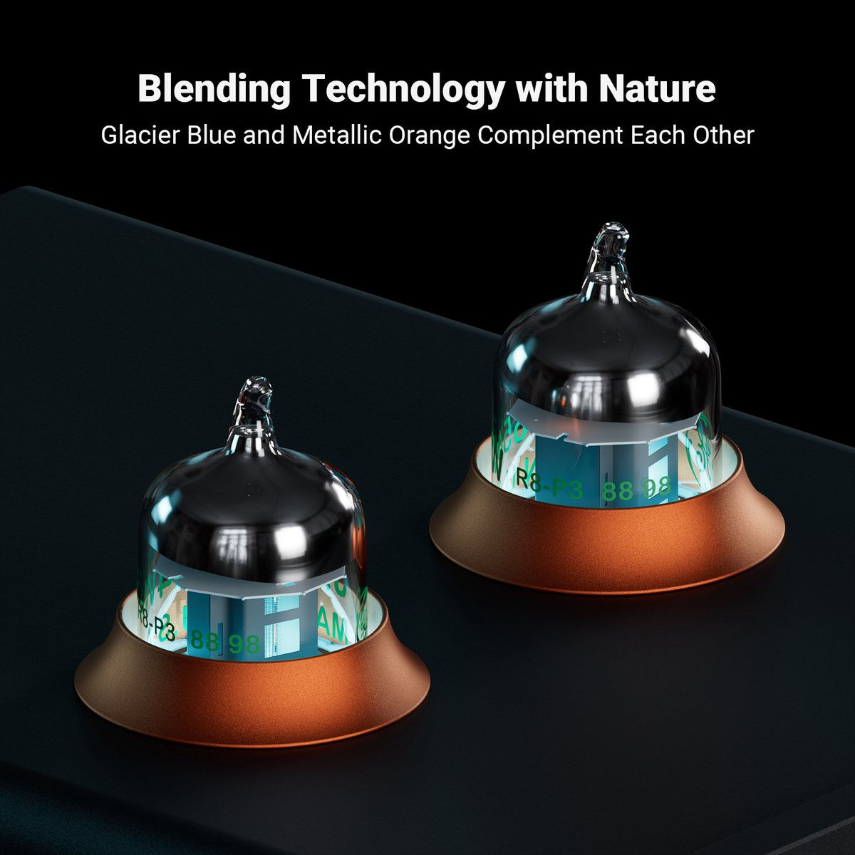Deux objets brillants en forme de dôme avec des bases orange sur fond sombre.