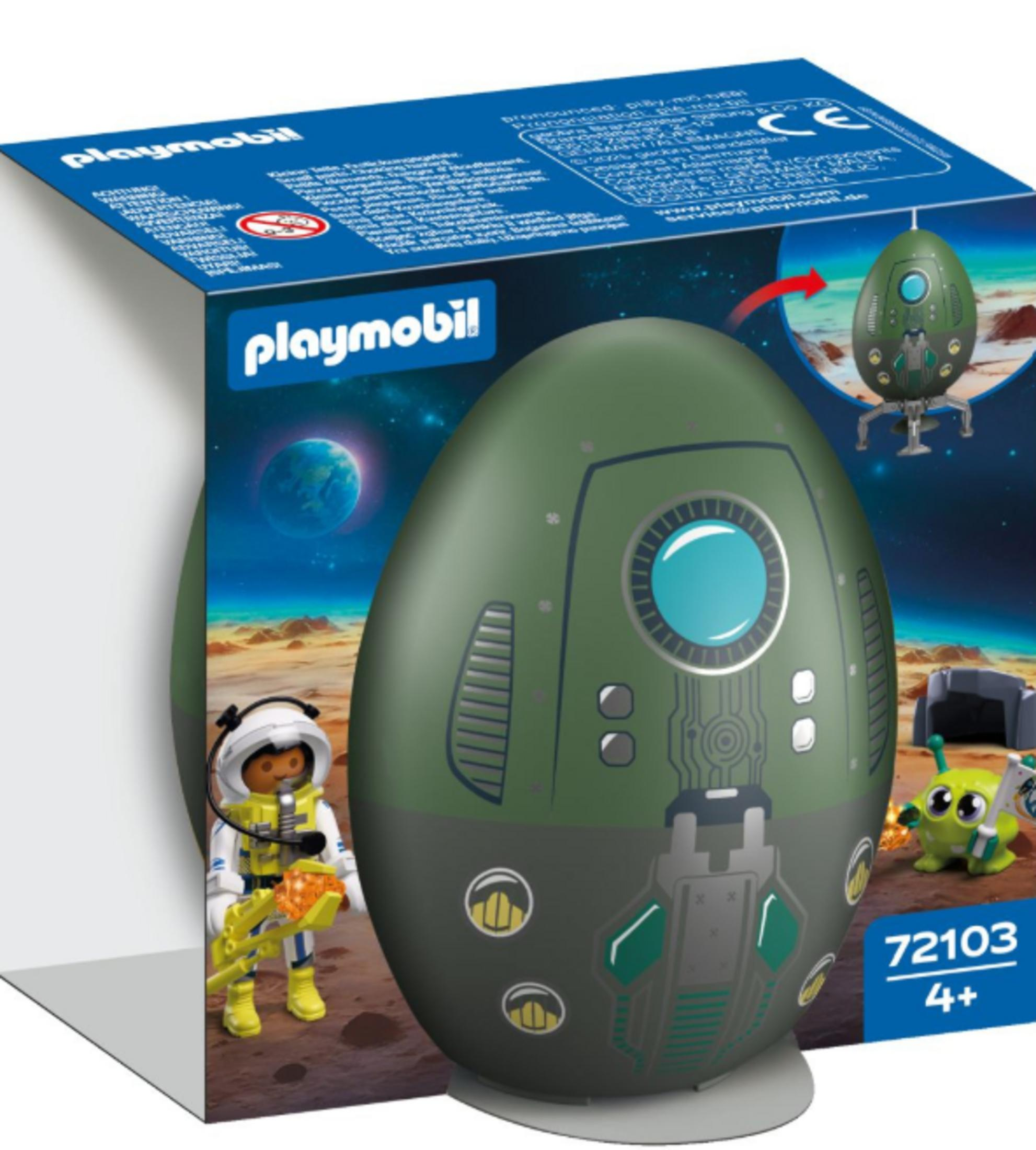 Set Playmobil con astronauta, navicella e alieno su un pianeta alieno.