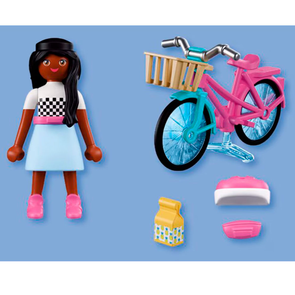 Una figura de juguete junto a una bicicleta rosa con cesta, caja de jugo y contenedores.