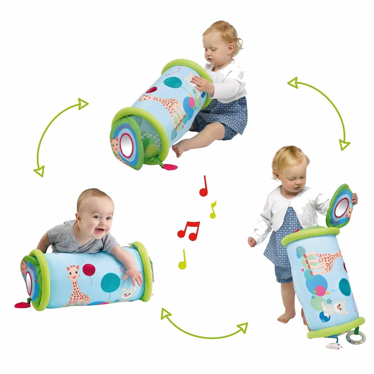 Niños pequeños juegan con un rodillo de actividades colorido con jirafas y osos.