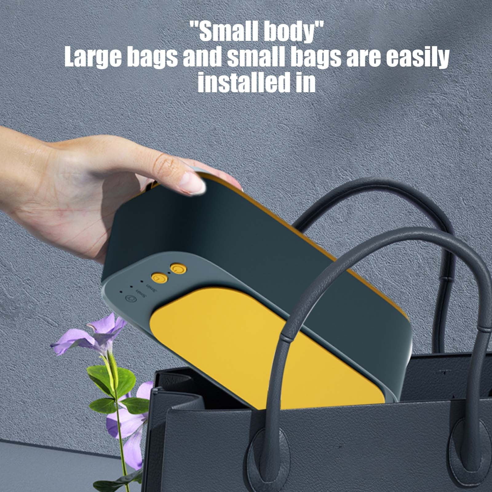 Eine Hand legt ein dunkles Gerät mit gelber Fläche in eine Tasche.