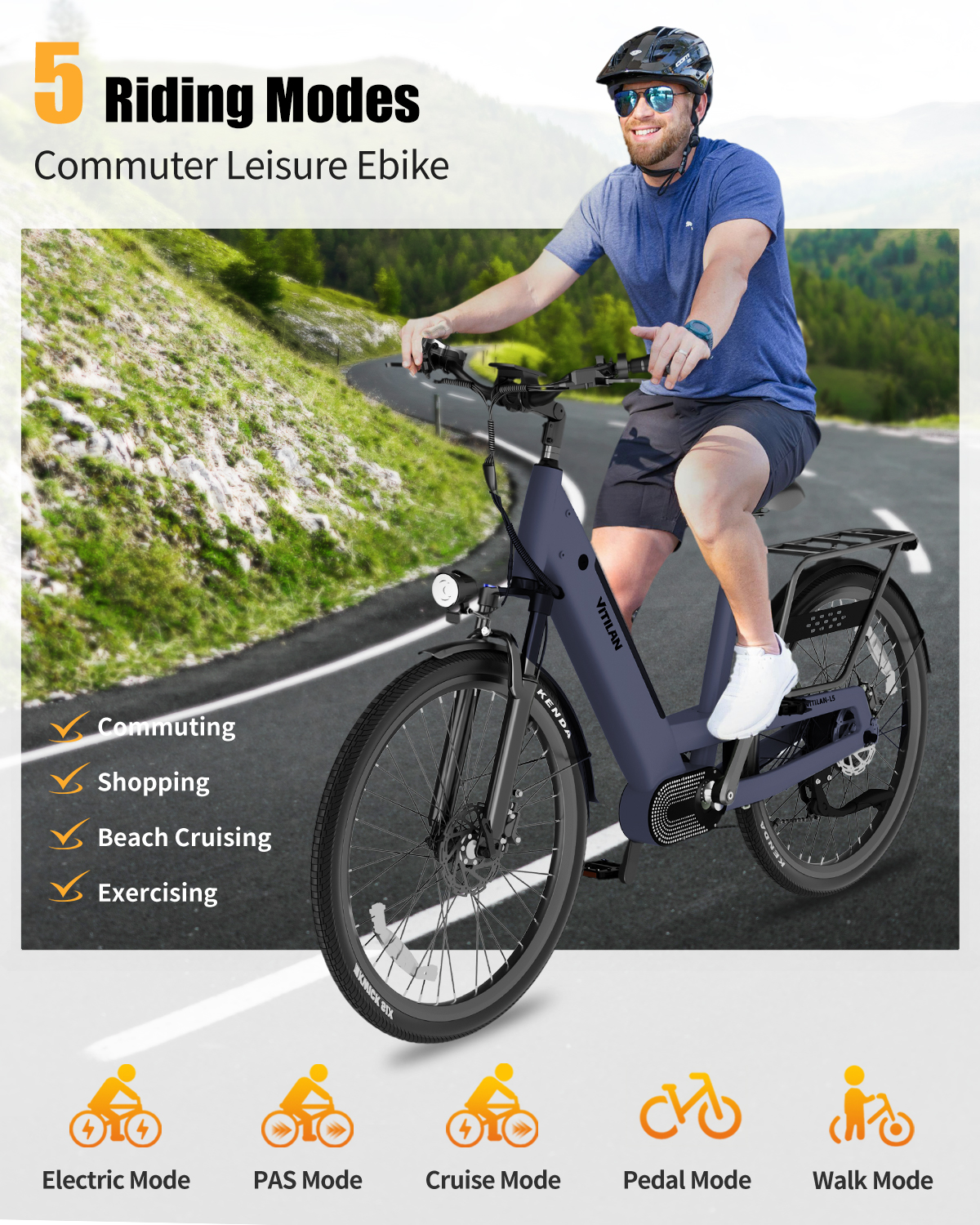Hombre monta una bicicleta eléctrica gris en una carretera con colinas verdes.