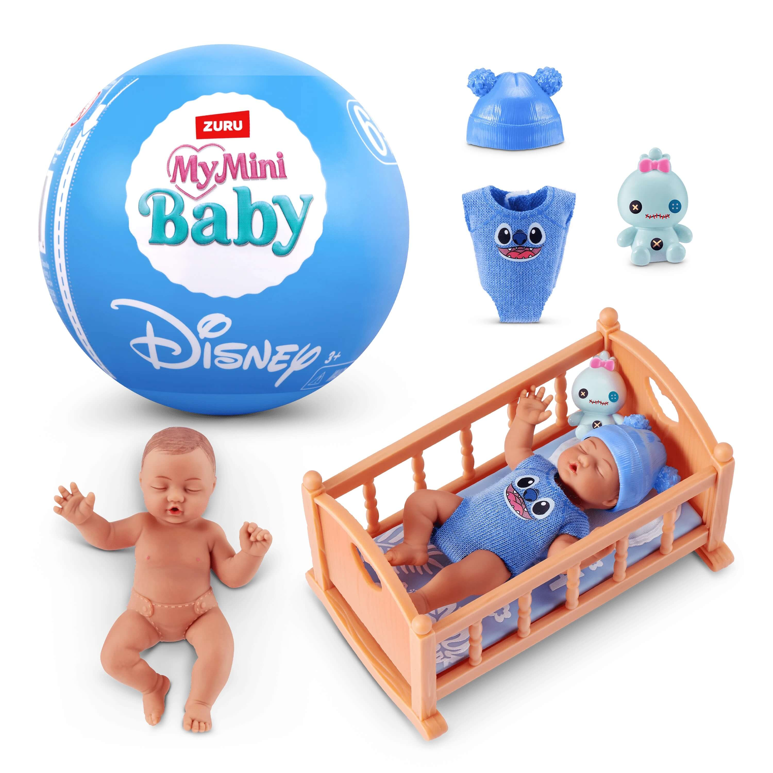 Un set de juguetes de bebé azul con una bola grande, dos muñecos y ropa.