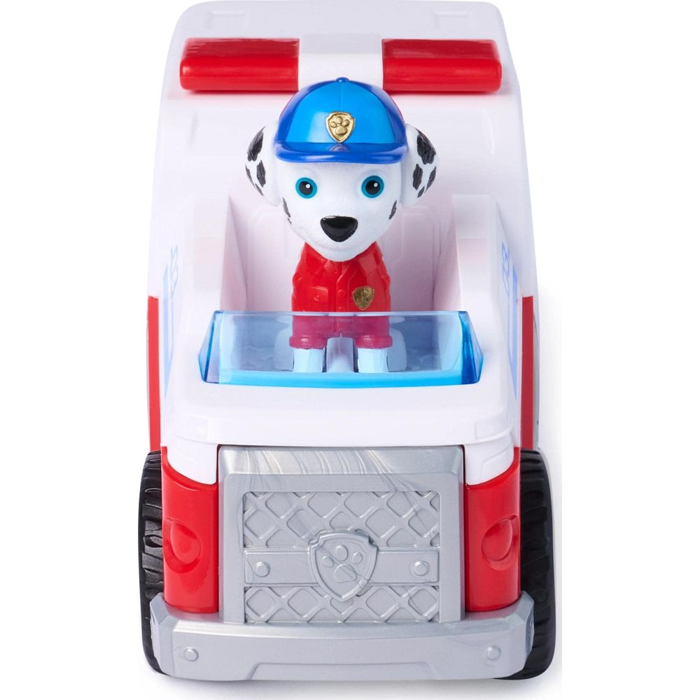 Un vehículo de juguete blanco con Marshall de Paw Patrol al volante.