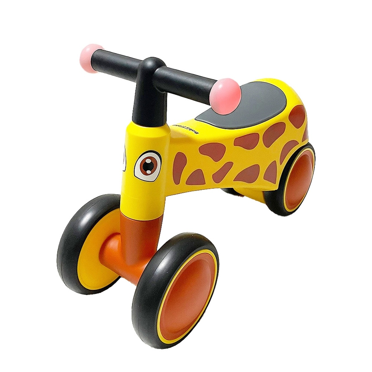 Ein gelbes Kleinkind-Laufrad mit Giraffenmuster und schwarzen Rädern.