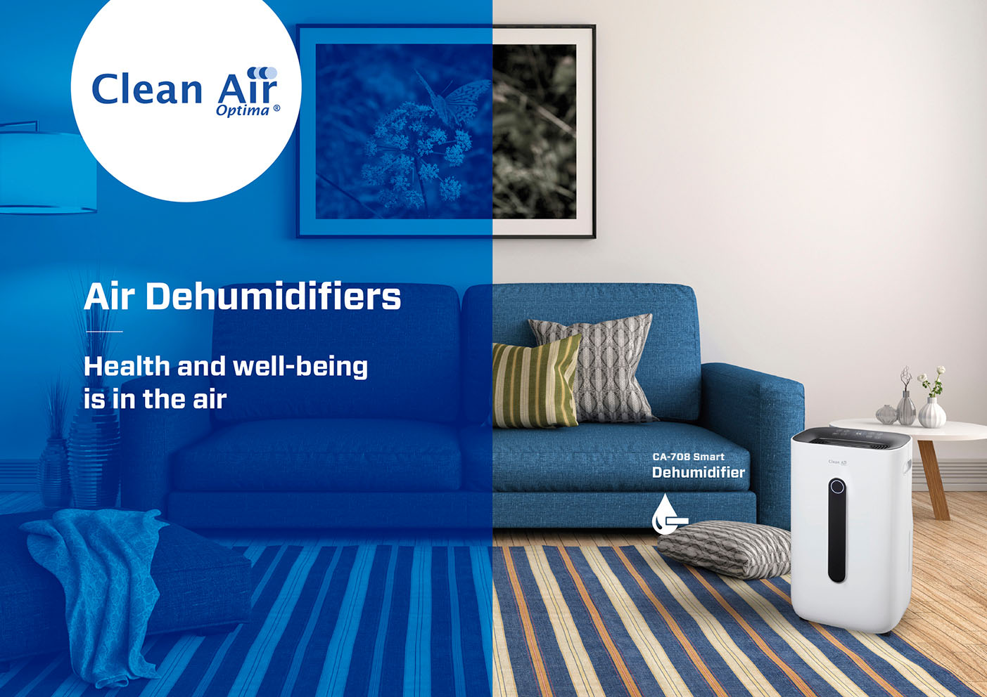 A white dehumidifier sits beside a blue sofa on a striped rug.