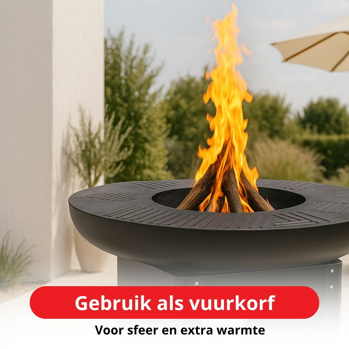 A large fire burns in a dark fire pit on a patio.