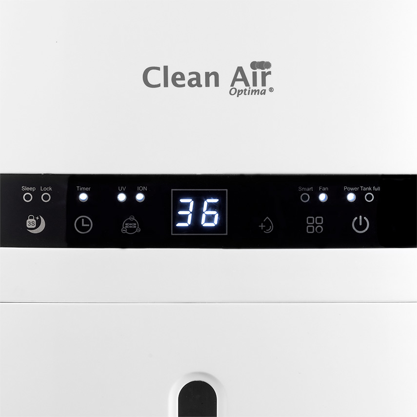 A white device with a black control panel and digital display showing 36.