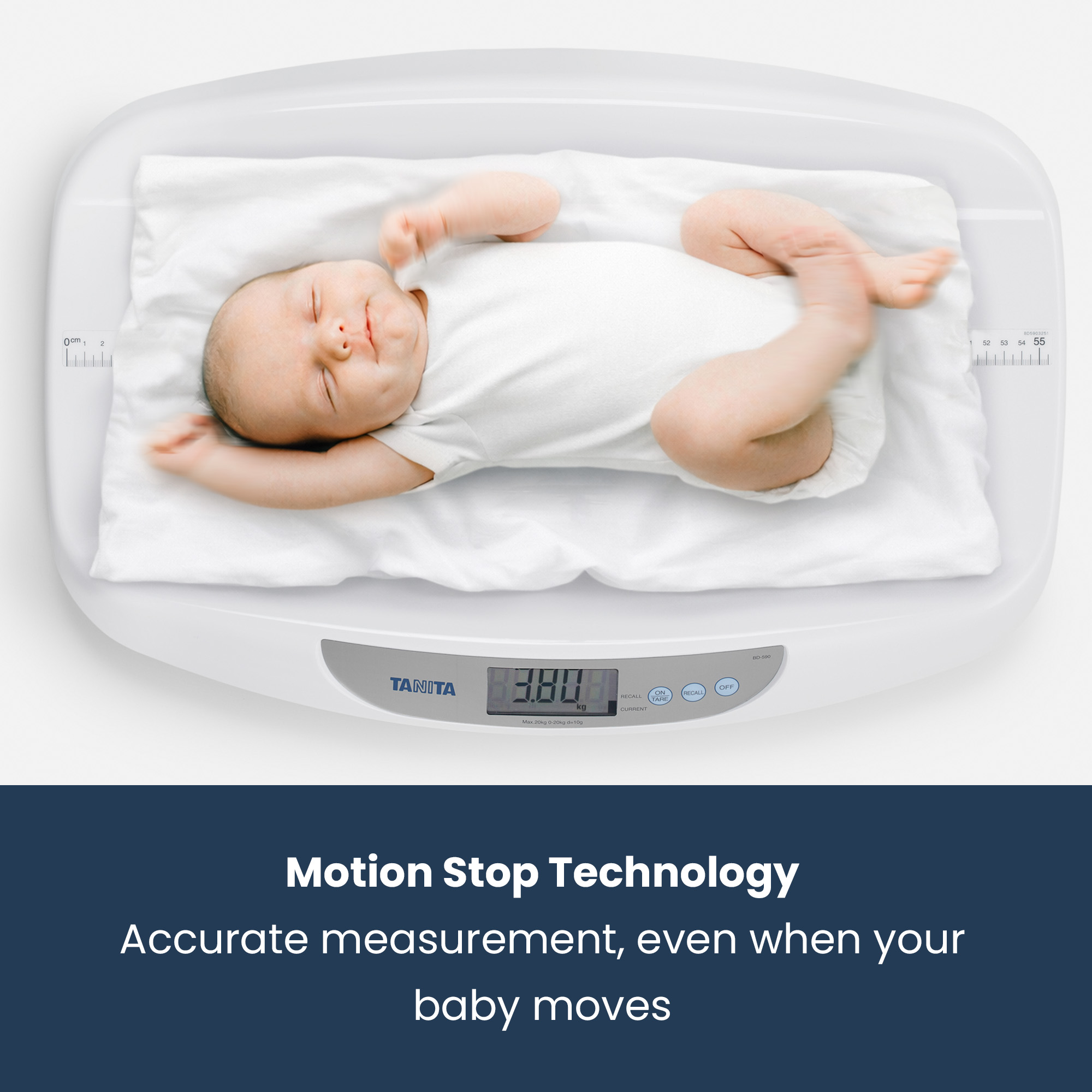 A sleeping baby lies on a white baby scale showing 3.80kg.