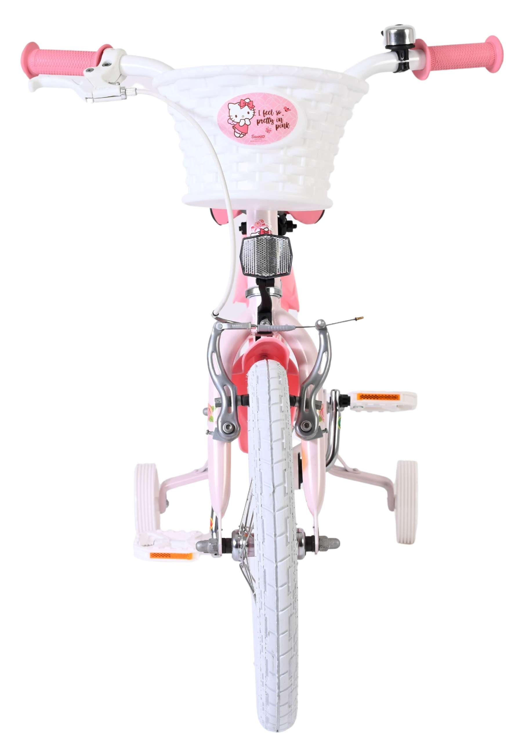 Ein rosafarbenes Kinderfahrrad mit Stützrädern und einem weißen Korb.