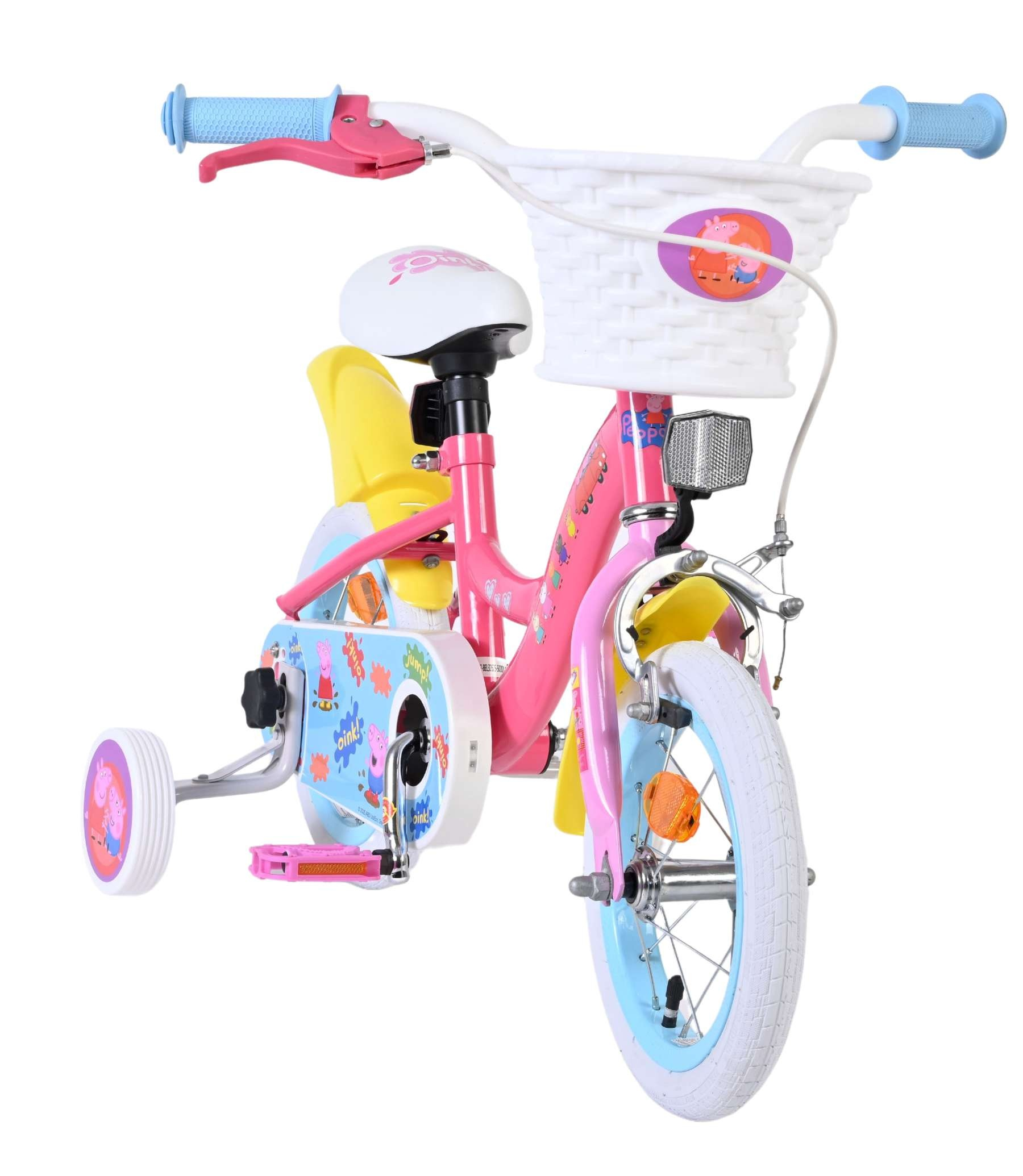 Ein pinkes Kinderfahrrad mit Stützrädern und einem weißen Korb vorne.