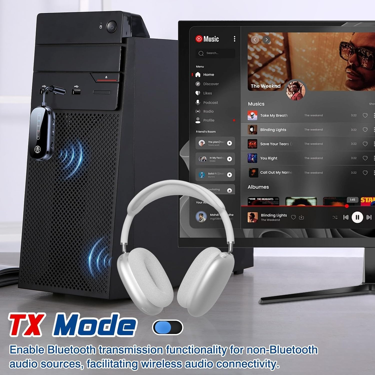 Ein schwarzer PC, weiße Kopfhörer und ein Monitor mit Musik-App. TX Mode.