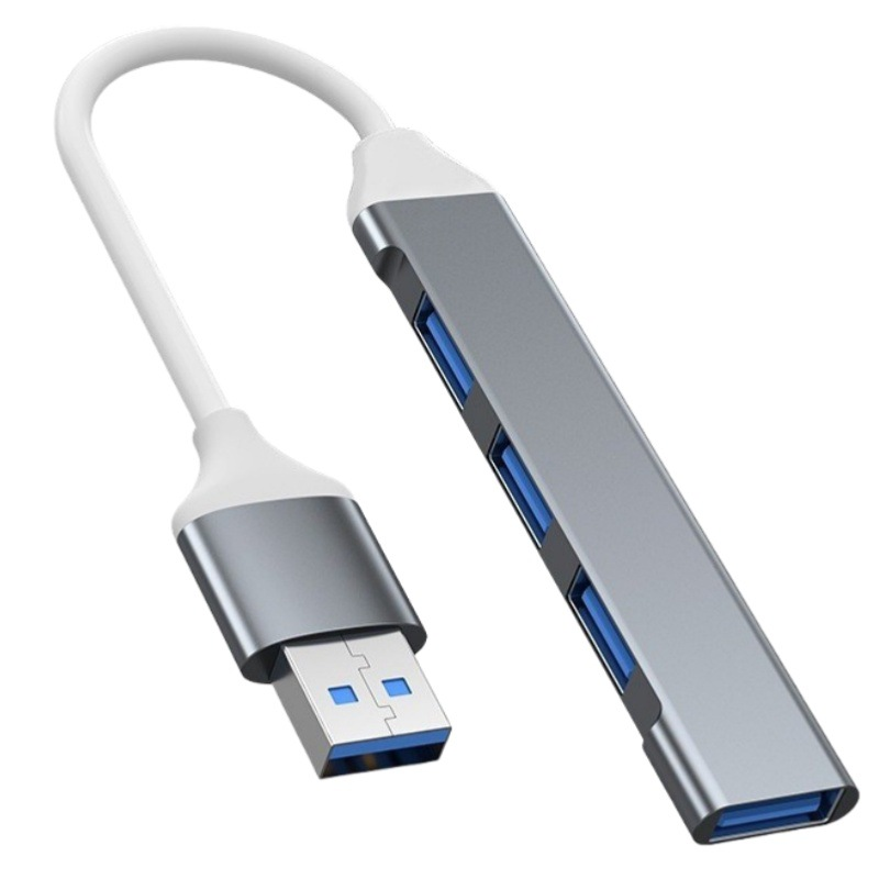 Eine silberne USB-Hub mit weißem Kabel und blauen USB-Anschlüssen.