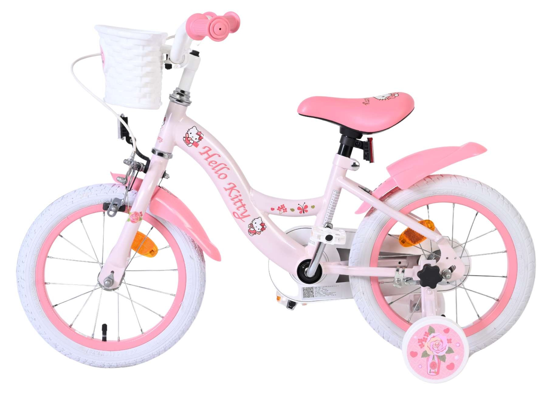 Ein rosafarbenes Hello Kitty Kinderfahrrad mit Stützrädern und weißem Korb.