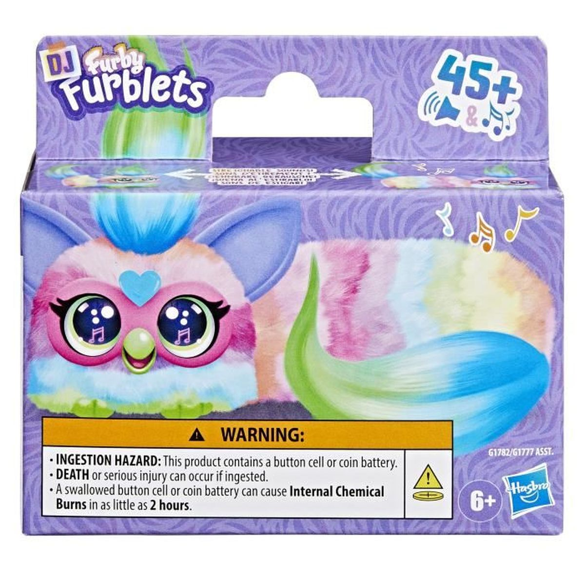 Verpackung eines Furby Furblets Spielzeugs mit Warnhinweisen und Altersangabe 6+.