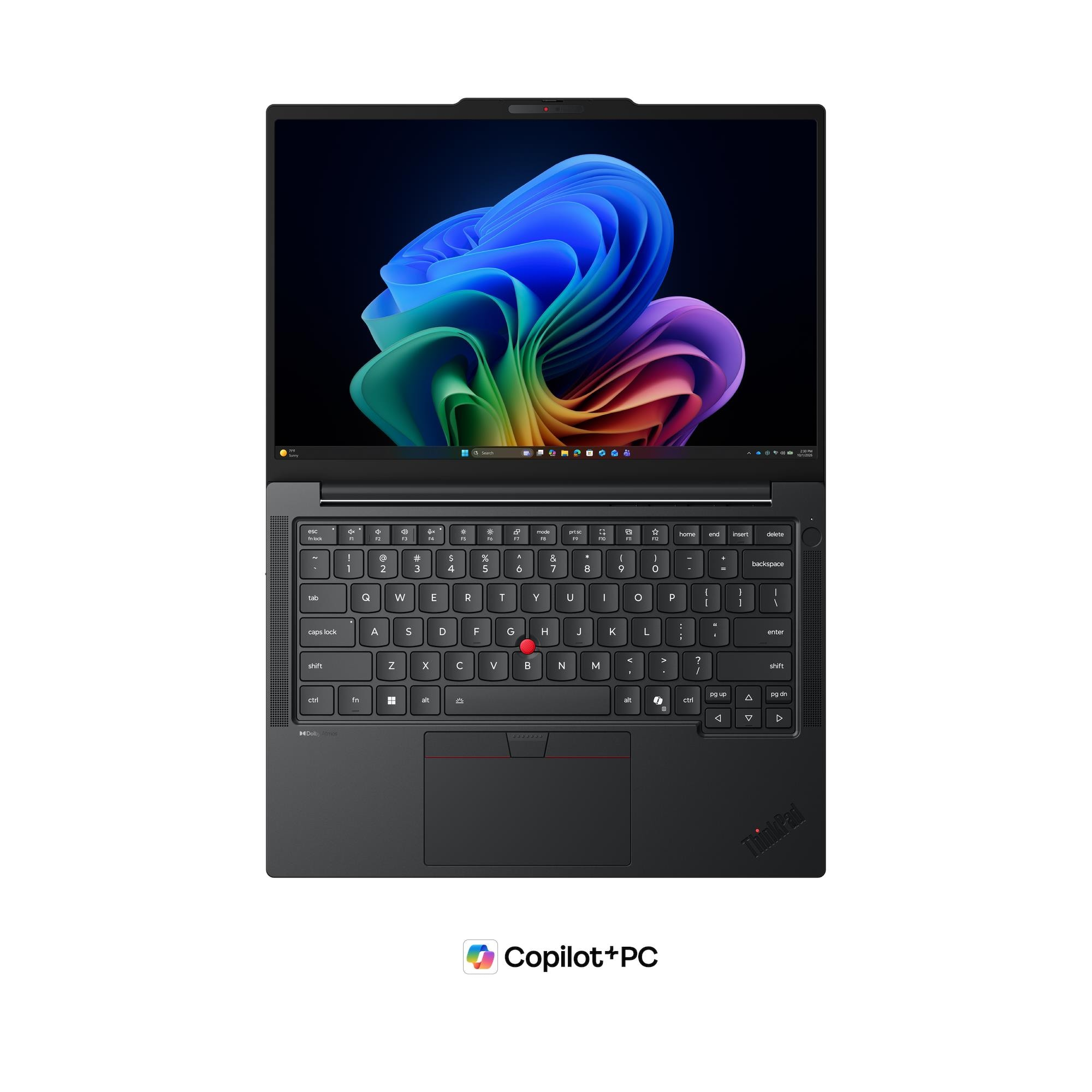 Un laptop che mostra uno sfondo colorato, con dettagli della tastiera visibili.