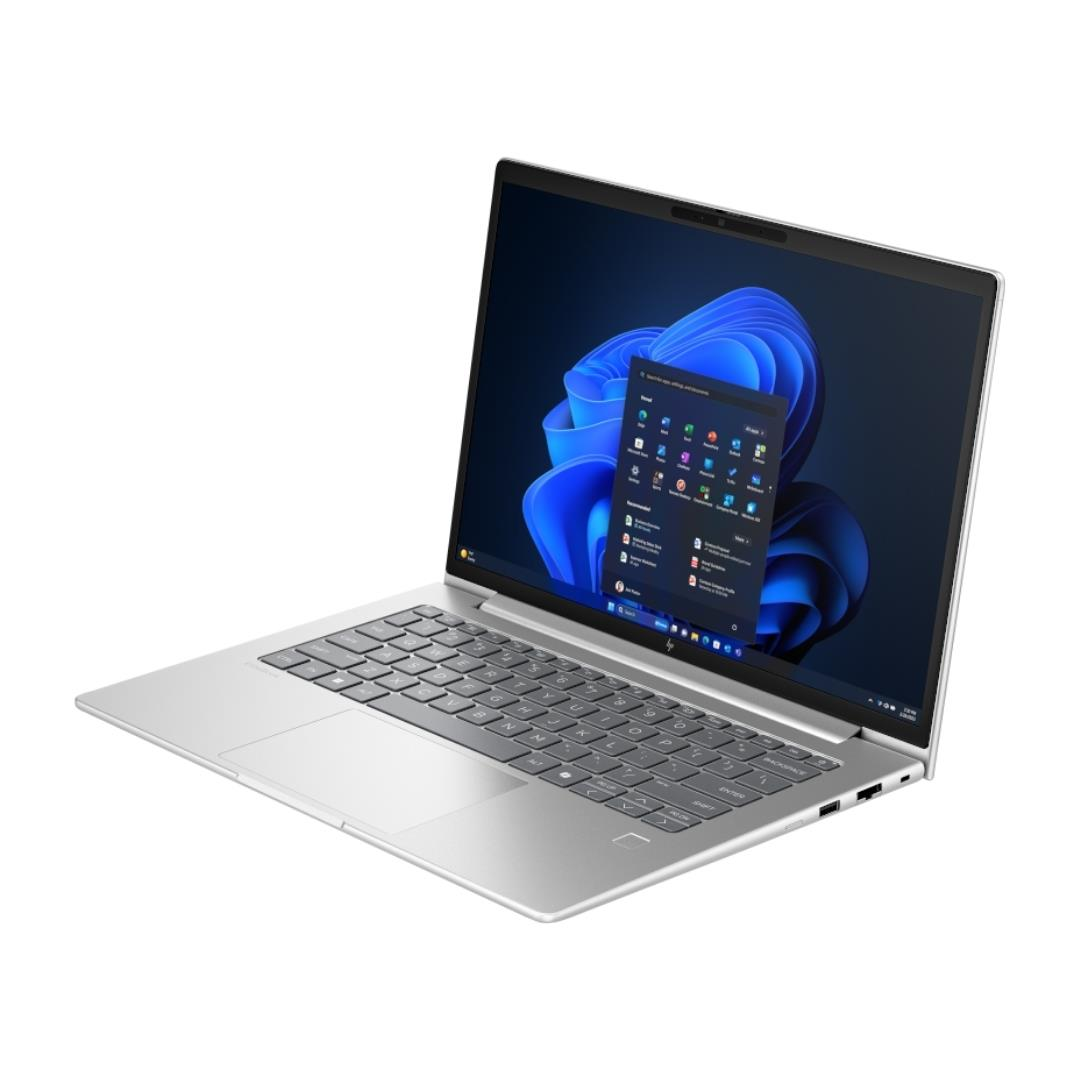 Windows 11 arayüzü ve mavi soyut duvar kağıdı gösteren ekranlı gümüş rengi dizüstü bilgisayar.