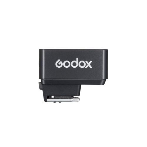 Zwarte Godox flitser met zilveren connector.