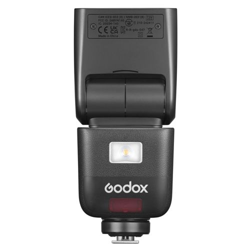 Ein schwarzer Godox-Kamerablitz mit weißer LED und roter Anzeige. FCC/CE-Zeichen.