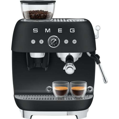Cafetera espresso negra con depósito de granos, dos tazas de espresso y vaporizador.