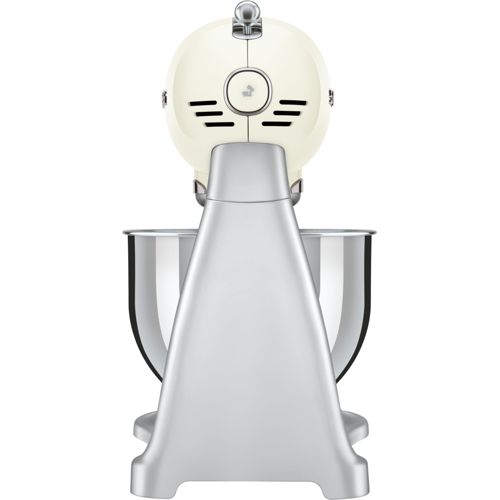 Un robot de cocina color crema con base y bol plateados, visto desde atrás.