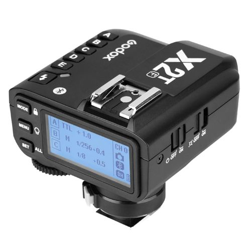Schwarzer Godox X2T Blitztrigger mit LCD-Display und Tasten.