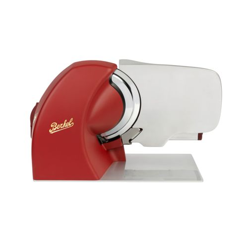 Ein roter Berkel-Schneideapparat mit silberner Klinge und durchsichtigem Ständer.