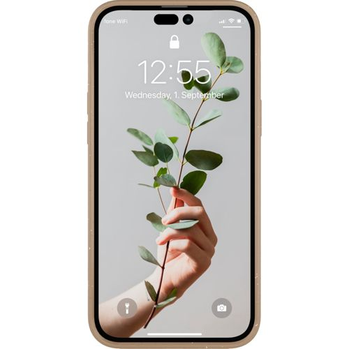 Eine Hand hält einen grünen Zweig vor einem iPhone-Sperrbildschirm.