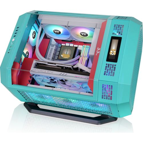 Un case PC turchese con pannello laterale in vetro, che mostra componenti interni e illuminazione RGB.